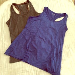 Pair of EUC Reebok tanks